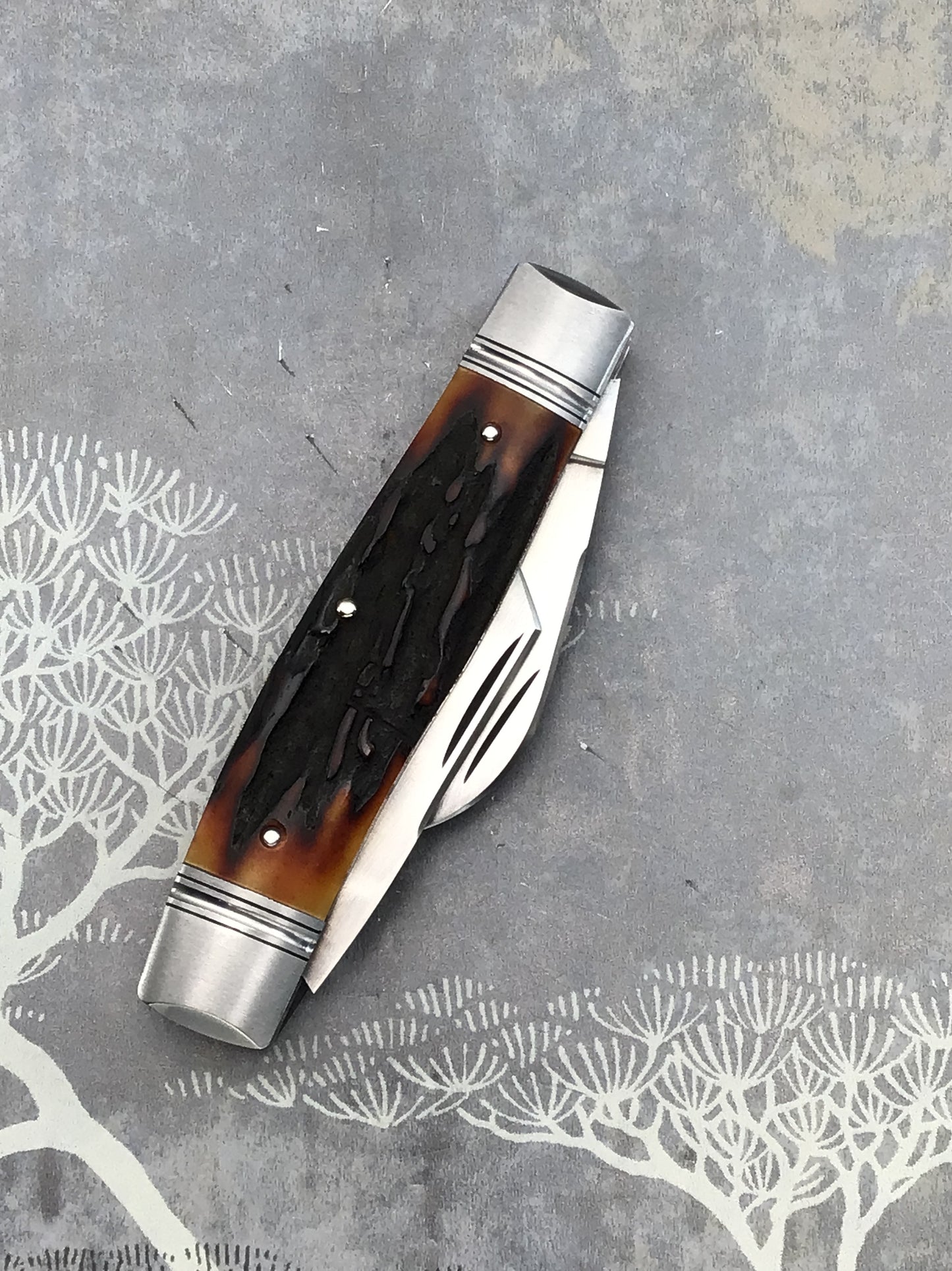 Rusty Preston “Stockman” slip joint with Amber Stag Scales