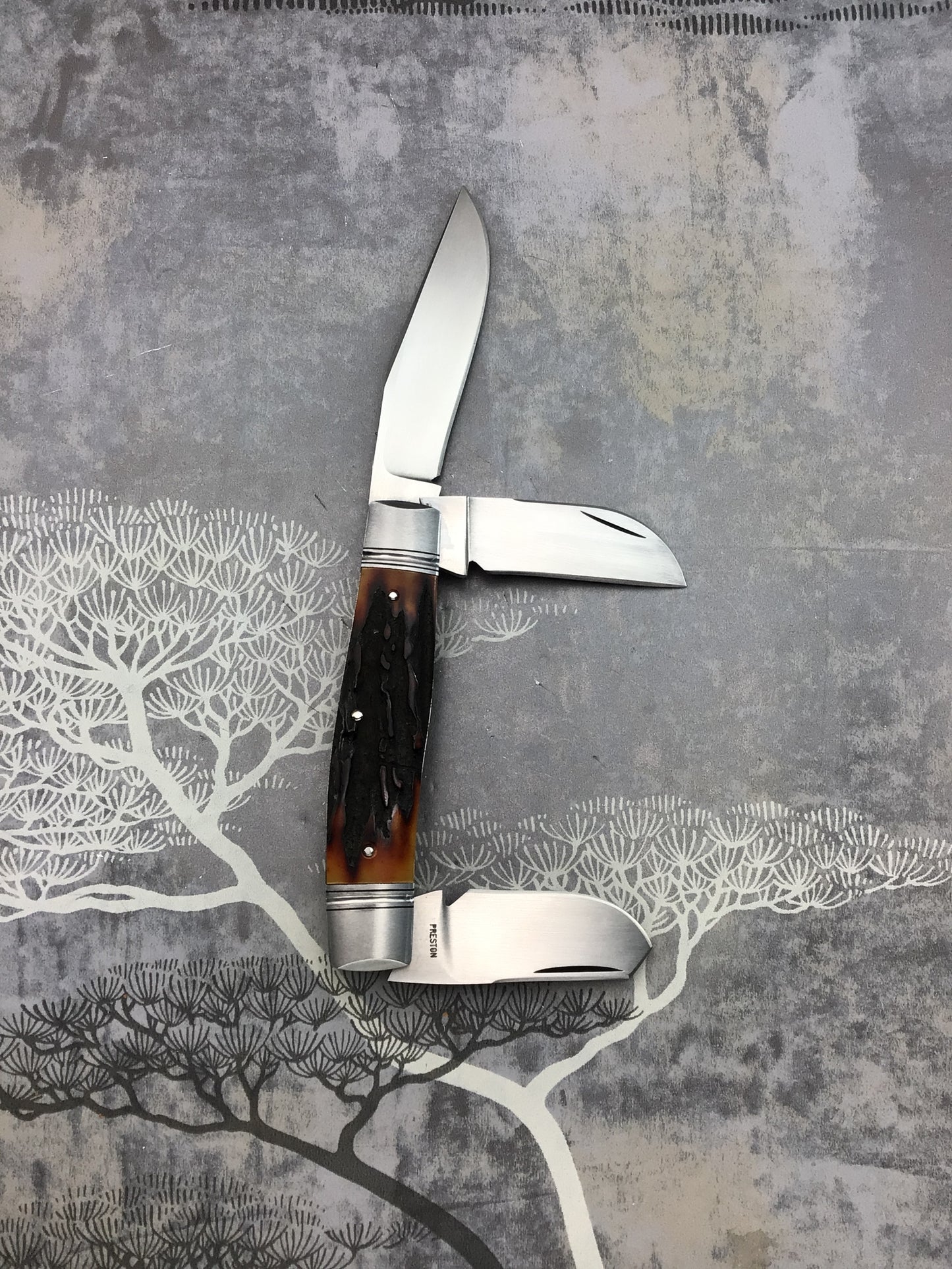 Rusty Preston “Stockman” slip joint with Amber Stag Scales