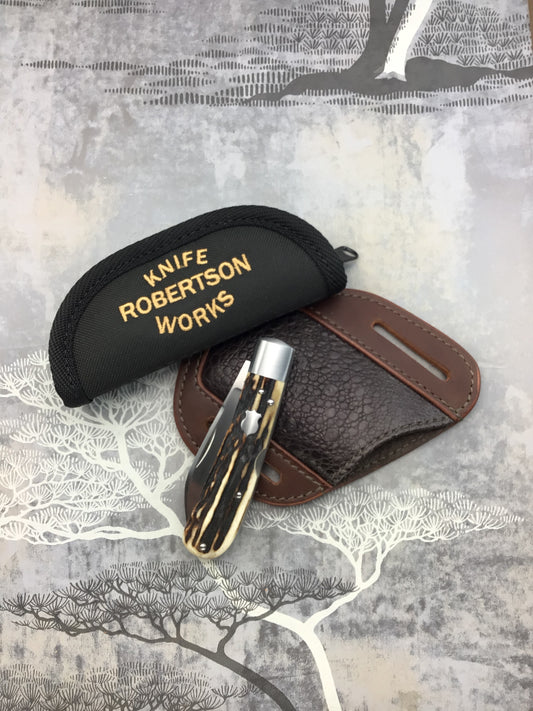 Tim Robertson “Hayes Model” mid lock with Sambar Stag scales. Comes with a Piper Robertson custom belt sheath