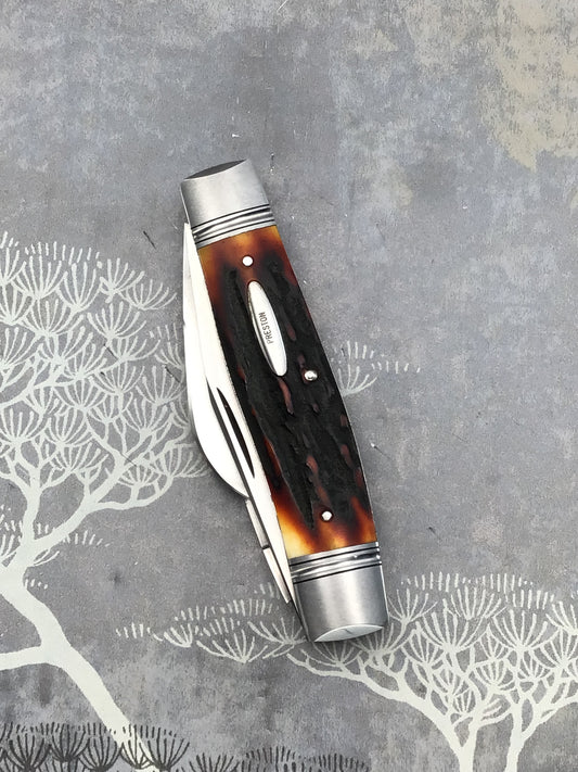 Rusty Preston “Stockman” slip joint with Amber Stag Scales